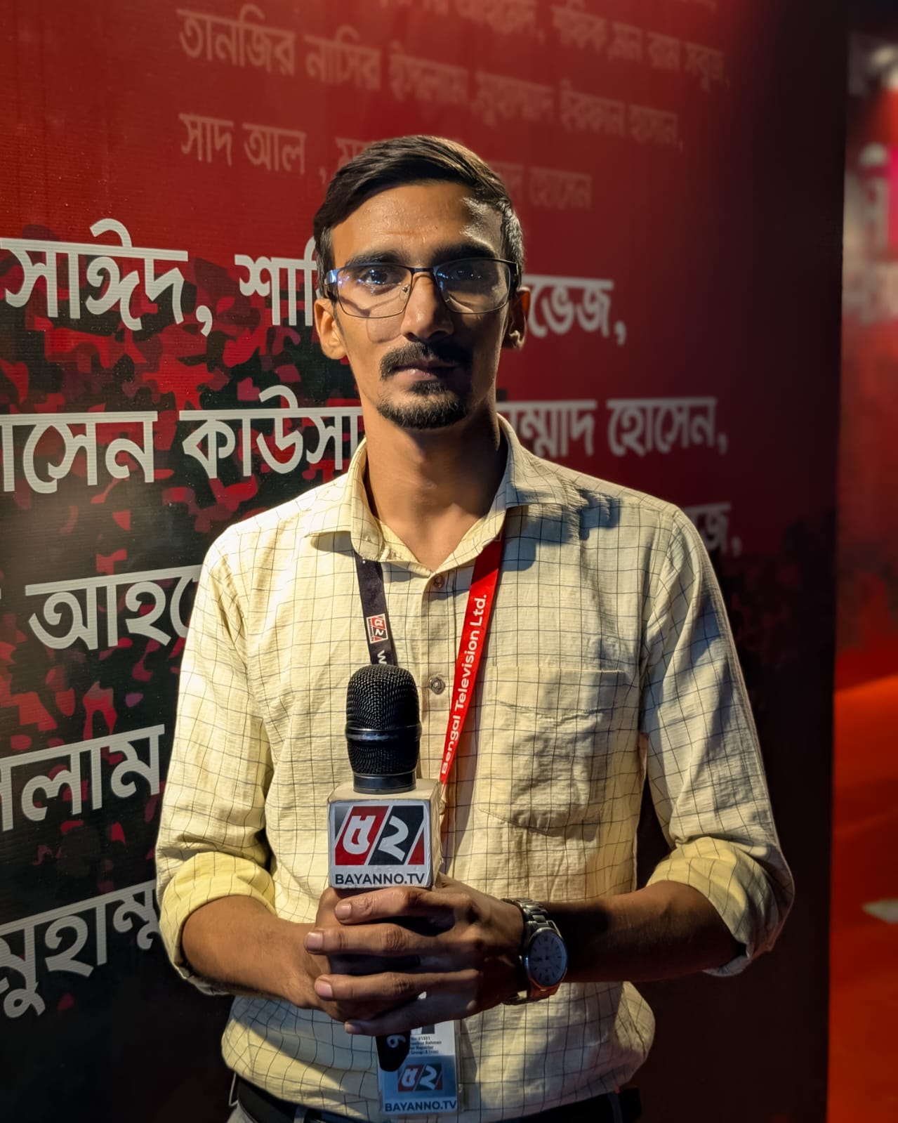 Portrait of a TV reporter holding a microphone